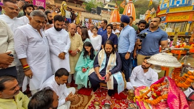 Anant Ambani, son of businessman Mukesh Ambani, with wife Radhika Merchant performing 'puja' at Har Ki Pauri, in Haridwar on Sunday. (PTI) Anant Ambani, son of businessman Mukesh Ambani, with wife Radhika Merchant performing 'puja' at Har Ki Pauri, in Haridwar on Sunday. (PTI)