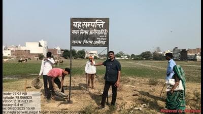 Aligarh Municipal Corporation taking possession of land in Aligarh on April 30. (HT photo) Aligarh Municipal Corporation taking possession of land in Aligarh on April 30. (HT photo)