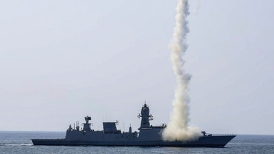 An Indian warship demonstrates its long-range precision strike capability during a drill in the Arabian Sea on Sunday. (PTI)