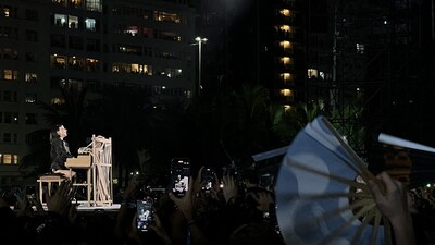 There was an electrifying scene as thousands of fans waved rainbow-themed fans and viewed on large screens along the beach as they sang along to her best-known songs, which included Alejandro, Poker Face, and Abracadabra. (AFP) There was an electrifying scene as thousands of fans waved rainbow-themed fans and viewed on large screens along the beach as they sang along to her best-known songs, which included Alejandro, Poker Face, and Abracadabra. (AFP)