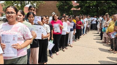 Candidates lining up at an exam centre to appear for the National Eligibility cum Entrance Test in Ludhiana on Sunday. (Gurpreet Singh/HT) Candidates lining up at an exam centre to appear for the National Eligibility cum Entrance Test in Ludhiana on Sunday. (Gurpreet Singh/HT)