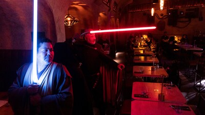 On the eve of Star Wars Day, May 3, 2025, Star Wars fans flock to Nowan's Cantina in Santiago, Chile, with light sabres in their hand to celebrate their love for the franchise. (AP Photo/Matias Basualdo) (AP) On the eve of Star Wars Day, May 3, 2025, Star Wars fans flock to Nowan's Cantina in Santiago, Chile, with light sabres in their hand to celebrate their love for the franchise. (AP Photo/Matias Basualdo) (AP)