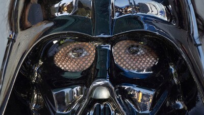 A child wearing a Darth Vader mask attends the "Expo Yoda" exhibition in Santiago, Chile, on the eve of Star Wars Day, May 3, 2025. (AP Photo/Matias Basualdo) (AP) A child wearing a Darth Vader mask attends the "Expo Yoda" exhibition in Santiago, Chile, on the eve of Star Wars Day, May 3, 2025. (AP Photo/Matias Basualdo) (AP)