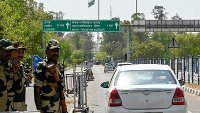Border Security Force (BSF) soldiers stand guard as tourists arrive to watch the retreat ceremony at the India-Pakistan Wagah border post on the outskirts of Amritsar on April 24, 2025. (AFP) Border Security Force (BSF) soldiers stand guard as tourists arrive to watch the retreat ceremony at the India-Pakistan Wagah border post on the outskirts of Amritsar on April 24, 2025. (AFP)