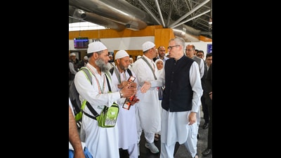 Jammu and Kashmir chief minister Omar Abdullah with Hajj pilgrims at Sheikh-ul-Alam International Airport in Srinagar on Sunday. (Photo: X) Jammu and Kashmir chief minister Omar Abdullah with Hajj pilgrims at Sheikh-ul-Alam International Airport in Srinagar on Sunday. (Photo: X)