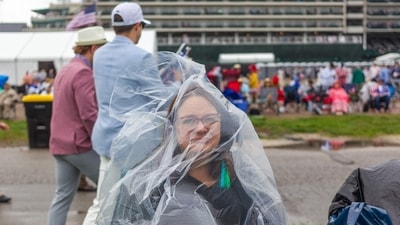 Fans arrive ahead of the 151st running of the Kentucky Derby at Churchill Downs in Louisville, Kentucky. (Leandro Lozado/AFP) Fans arrive ahead of the 151st running of the Kentucky Derby at Churchill Downs in Louisville, Kentucky. (Leandro Lozado/AFP)