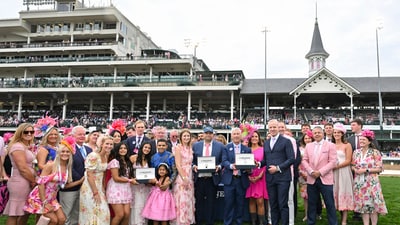 Matthias Breschan, center right, CEO, Longines, and Brittany Garcia, center, Longines US Brand President, present Longines timepieces to the connections of Good Cheer, including trainer Brad Cox, center, jockey Luis Saez, left, and Godolphin's Michael Banahan, after the three-year-old filly wins the 151st running of the Longines Kentucky Oaks. (AP) Matthias Breschan, center right, CEO, Longines, and Brittany Garcia, center, Longines US Brand President, present Longines timepieces to the connections of Good Cheer, including trainer Brad Cox, center, jockey Luis Saez, left, and Godolphin's Michael Banahan, after the three-year-old filly wins the 151st running of the Longines Kentucky Oaks. (AP)