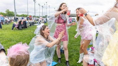 Fans celebrate ahead of the 151st running of the Kentucky Derby at Churchill Downs on May 3, 2025, in Louisville, Kentucky. (Leandro Lozada/AFP) Fans celebrate ahead of the 151st running of the Kentucky Derby at Churchill Downs on May 3, 2025, in Louisville, Kentucky. (Leandro Lozada/AFP)