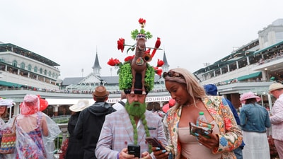 Spectators attend the 151st Kentucky Derby, in Louisville, Kentucky (REUTERS)
