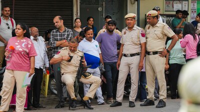 Police personnel outside an examination centre during the NEET UG exam 2025 in New Delhi on Sunday, May 4, 2025. (PTI) Police personnel outside an examination centre during the NEET UG exam 2025 in New Delhi on Sunday, May 4, 2025. (PTI)