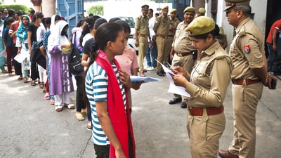 Police personnel check documents of aspirants who arrived to appear for the NEET UG exam, in Meerut on Sunday, May 4, 2025. (PTI) Police personnel check documents of aspirants who arrived to appear for the NEET UG exam, in Meerut on Sunday, May 4, 2025. (PTI)