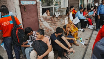 Relatives wait outside an examination centre during the NEET UG exam 2025, in New Delhi, Sunday, May 4, 2025. (PTI) Relatives wait outside an examination centre during the NEET UG exam 2025, in New Delhi, Sunday, May 4, 2025. (PTI)