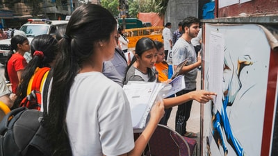 Aspirants check their roll number to appear for the NEET UG exam 2025, in New Delhi, Sunday, May 4, 2025. (PTI) Aspirants check their roll number to appear for the NEET UG exam 2025, in New Delhi, Sunday, May 4, 2025. (PTI)