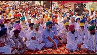 Residents and farm leaders protest against illegal sand mining in Gaunsgarh village in Ludhiana on Sunday. (HT Photo) Residents and farm leaders protest against illegal sand mining in Gaunsgarh village in Ludhiana on Sunday. (HT Photo)