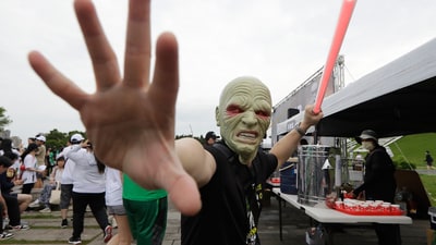 A runner dressed as a beloved Star Wars character struck a pose at the start of the Star Wars Run event in New Taipei City, Taiwan, on Sunday, May 4, 2025. (AP Photo/Chiang Ying-ying) (AP) A runner dressed as a beloved Star Wars character struck a pose at the start of the Star Wars Run event in New Taipei City, Taiwan, on Sunday, May 4, 2025. (AP Photo/Chiang Ying-ying) (AP)