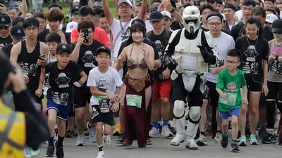On Sunday, May 4, 2025, participants of all ages, dressed as their favourite Star Wars characters, join in the excitement of the Star Wars Run event in New Taipei City, Taiwan. (AP Photo/Chiang Ying-ying) (AP) On Sunday, May 4, 2025, participants of all ages, dressed as their favourite Star Wars characters, join in the excitement of the Star Wars Run event in New Taipei City, Taiwan. (AP Photo/Chiang Ying-ying) (AP)