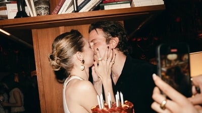 Gigi Hadid and Bradley Cooper seal it with a kiss during her birthday celebrations. Gigi Hadid and Bradley Cooper seal it with a kiss during her birthday celebrations.