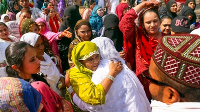 Pilgrims greet their family members and relatives as they leave for annual Hajj pilgrimage, at Sardar Vallabhbhai Patel International Airport, in Ahmedabad, Gujarat (PTI) Pilgrims greet their family members and relatives as they leave for annual Hajj pilgrimage, at Sardar Vallabhbhai Patel International Airport, in Ahmedabad, Gujarat (PTI)