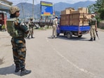 Jammu and Kashmir: An army personnel patrols a road in Poonch.
