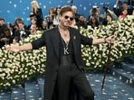 Met Gala: Shah Rukh Khan strikes his iconic pose on red carpet. Met Gala: Shah Rukh Khan strikes his iconic pose on red carpet.