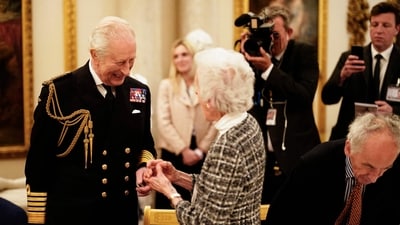 Britain's King Charles III (L) speaks with a Second World War veteran during a tea party at Buckingham Palace on May 5, 2025. (AFP) Britain's King Charles III (L) speaks with a Second World War veteran during a tea party at Buckingham Palace on May 5, 2025. (AFP)