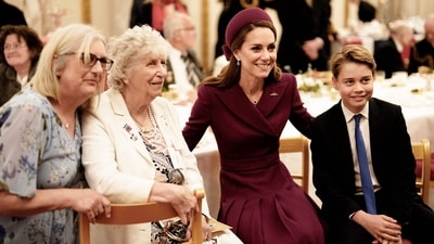 Britain's Catherine, Princess of Wales (2nd R) and Britain's Prince George of Wales (R) pose for pictures during a tea party for Second World War veterans at Buckingham Palace on May 5, 2025 to celebrate the 80th anniversary of VE Day also known as Victory in Europe Day, marking the end of the Second World War in Europe. (AFP) Britain's Catherine, Princess of Wales (2nd R) and Britain's Prince George of Wales (R) pose for pictures during a tea party for Second World War veterans at Buckingham Palace on May 5, 2025 to celebrate the 80th anniversary of VE Day also known as Victory in Europe Day, marking the end of the Second World War in Europe. (AFP)
