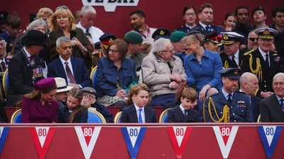 Prince Louis (second from right) sticks out his tongue, makes silly faces during the military procession for the 80th anniversary of V-E Day. (Getty Images) Prince Louis (second from right) sticks out his tongue, makes silly faces during the military procession for the 80th anniversary of V-E Day. (Getty Images)
