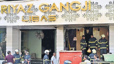 Mumbai, India - May 5, 2025:Fire Brigade officials during cooling operation at "Libas"- Riyaz Gangji, after it was gutted by fire at Pedder Road, in Mumbai, India, on Monday, May 5, 2025. (Photo by Anshuman Poyrekar/ Hindustan Times) (Hindustan Times) Mumbai, India - May 5, 2025:Fire Brigade officials during cooling operation at "Libas"- Riyaz Gangji, after it was gutted by fire at Pedder Road, in Mumbai, India, on Monday, May 5, 2025. (Photo by Anshuman Poyrekar/ Hindustan Times) (Hindustan Times)