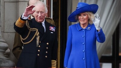 Britain's King Charles III and Britain's Queen Camilla wave to crowds, on the balcony of Buckingham Palace after attending the armed forces procession on May 5, 2025 to celebrate the 80th anniversary of VE Day also known as Victory in Europe Day, marking the end of the Second World War in Europe. (AFP) Britain's King Charles III and Britain's Queen Camilla wave to crowds, on the balcony of Buckingham Palace after attending the armed forces procession on May 5, 2025 to celebrate the 80th anniversary of VE Day also known as Victory in Europe Day, marking the end of the Second World War in Europe. (AFP)