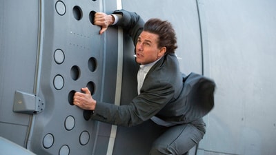 Tom Cruise held onto the side of an aeroplane in Mission: Impossible—Rogue Nation. (Paramount Pictures) Tom Cruise held onto the side of an aeroplane in Mission: Impossible—Rogue Nation. (Paramount Pictures)