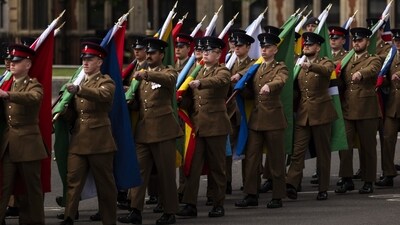 Festivities commenced with a grand military parade, street parties, and a Royal Air Force flypast over central London. (Bloomberg) Festivities commenced with a grand military parade, street parties, and a Royal Air Force flypast over central London. (Bloomberg)