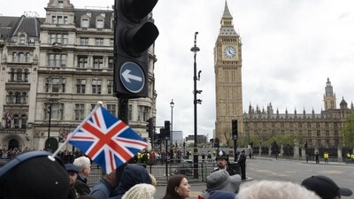 Onlookers watch the VE Day 80 procession as members of the British Armed Forces pass the Houses of Parliament in London, UK, on Monday, May 5, 2025. The UK is marking the 80th anniversary of Victory in Europe, or VE Day, when Britain and its allies accepted the surrender of Nazi Germany. Photographer: Jose Sarmento Matos/Bloomberg (Bloomberg) Onlookers watch the VE Day 80 procession as members of the British Armed Forces pass the Houses of Parliament in London, UK, on Monday, May 5, 2025. The UK is marking the 80th anniversary of Victory in Europe, or VE Day, when Britain and its allies accepted the surrender of Nazi Germany. Photographer: Jose Sarmento Matos/Bloomberg (Bloomberg)