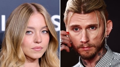Sydney Sweeney shares warm hug with Machine Gun Kelly at Las Vegas event (REUTERS/Steve Marcus, photo by HENRY NICHOLLS / AFP) Sydney Sweeney shares warm hug with Machine Gun Kelly at Las Vegas event (REUTERS/Steve Marcus, photo by HENRY NICHOLLS / AFP)