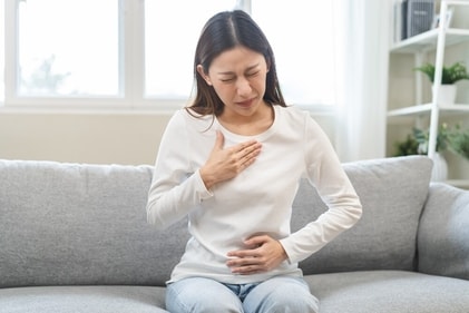 You feel a strong burning sensation in your chest, also known as heartburn. (Shutterstock)