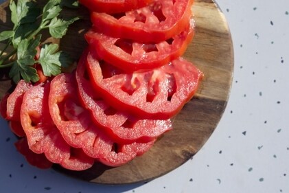 Tomato slices are eaten raw, as salad, along with meals. (Shutterstock)