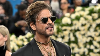 Bollywood superstar Shah Rukh Khan dazzled at the Met Gala on May 5, wearing a striking black suit by Sabyasachi. (Photo by Evan Agostini/Invision/AP) (Evan Agostini/Invision/AP) Bollywood superstar Shah Rukh Khan dazzled at the Met Gala on May 5, wearing a striking black suit by Sabyasachi. (Photo by Evan Agostini/Invision/AP) (Evan Agostini/Invision/AP)