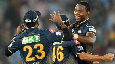 Gujarat Titans' Kagiso Rabada (R) celebrates with teammates (AFP) Gujarat Titans' Kagiso Rabada (R) celebrates with teammates (AFP)