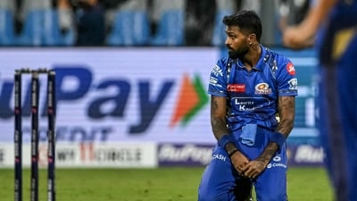 A pulsating match that was marred by rain breaks in the second innings finally finished Gujarat Titans' way as they beat the Mumbai Indians by three wickets off the very last ball of the match. GT's 156-run target was reduced to 147 needed off 19 overs when a rain break forced players off after the 18th. GT hence needed 15 runs to win int he one over that could be bowled after resumption and they completed it with a single off the last ball of the match. (AFP) A pulsating match that was marred by rain breaks in the second innings finally finished Gujarat Titans' way as they beat the Mumbai Indians by three wickets off the very last ball of the match. GT's 156-run target was reduced to 147 needed off 19 overs when a rain break forced players off after the 18th. GT hence needed 15 runs to win int he one over that could be bowled after resumption and they completed it with a single off the last ball of the match. (AFP)