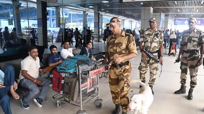 Central Industrial Security Force (CISF) and dog squad personnel at Jaiprakash Narayan International Airport in Patna on Tuesday. (Santosh Kumar/HT) Central Industrial Security Force (CISF) and dog squad personnel at Jaiprakash Narayan International Airport in Patna on Tuesday. (Santosh Kumar/HT)