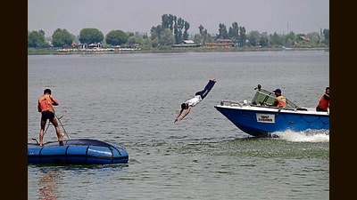 SDRF personnel during a mock drill on the Dal Lake in Srinagar on Tuesday. (Waseem Andrabi /HT) SDRF personnel during a mock drill on the Dal Lake in Srinagar on Tuesday. (Waseem Andrabi /HT)