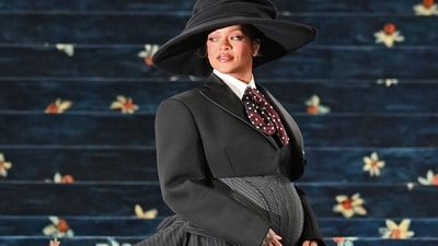 Rihanna, the 37-year-old singer, is expecting her third child with husband A$AP Rocky, who is co-chairing this year's Met Gala. (Photo by Andrea RENAULT / AFP) (AFP) Rihanna, the 37-year-old singer, is expecting her third child with husband A$AP Rocky, who is co-chairing this year's Met Gala. (Photo by Andrea RENAULT / AFP) (AFP)