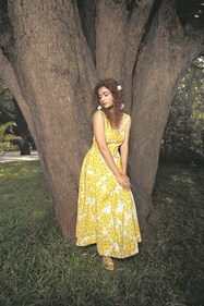 Keerthy is radiant in a vibrant yellow Anarkali by W For Woman. The floral print and scalloped edges add to the light, summer-y vibes. Her makeup is fresh and dewy, while her hair is style in soft, elegant curls and adorned with fresh flowers for a touch of whimsy and romance. (Photographer: Sarang Gupta) Keerthy is radiant in a vibrant yellow Anarkali by W For Woman. The floral print and scalloped edges add to the light, summer-y vibes. Her makeup is fresh and dewy, while her hair is style in soft, elegant curls and adorned with fresh flowers for a touch of whimsy and romance. (Photographer: Sarang Gupta)