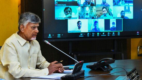 Chief Minister N Chandrababu Naidu interacts with collectors of various districts through video conference during a review meeting on the crop damage caused by unseasonal rains. (PTI)
