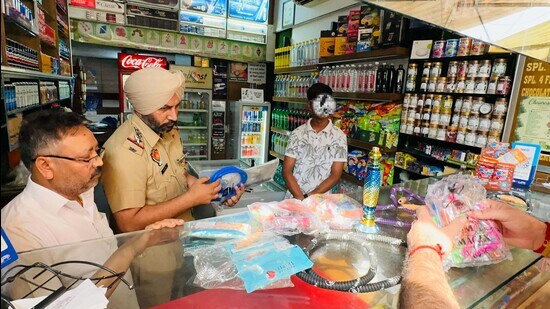 Police during the raid on Sat Paul Mittal Road in Ludhiana on Tuesday. (HT Photo)