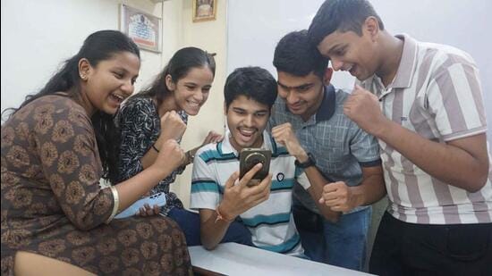 Thane, India - May -05, 2025: HSC 12th results have been declared and students are seen in Thane checking the results on their mobile phone and celebrating ,in Thane,in Mumbai, India, on, Monday, May -05, 2025. ( Praful Gangurde /HT Photo )