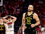 Golden State Warriors guard Stephen Curry (30) reacts after scoring a basket during the second half of game seven of the first round for the 2025 NBA Playoffs against the Houston Rockets at Toyota Center. Mandatory Credit: Troy Taormina-Imagn