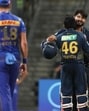 Gujarat Titans defeated Mumbai Indians by 3 wickets in a rain-affected match at the Wankhede Stadium in Mumbai. (REUTERS) Gujarat Titans defeated Mumbai Indians by 3 wickets in a rain-affected match at the Wankhede Stadium in Mumbai. (REUTERS)