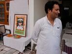 Sunil Swami stands next to a framed portrait of his son-in-law and Indian naval officer Vinay Narwal, who was killed by terrorists in Pahalgam. Sunil Swami stands next to a framed portrait of his son-in-law and Indian naval officer Vinay Narwal, who was killed by terrorists in Pahalgam.