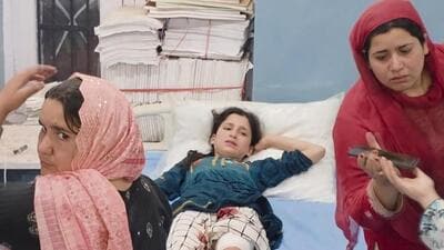 A child injured in Pakistani shelling receives treatment at a hospital at Uri in Baramulla district on Wednesday. (PTI Photo) A child injured in Pakistani shelling receives treatment at a hospital at Uri in Baramulla district on Wednesday. (PTI Photo)