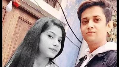 File photo of the accused with his wife. (Sourced)